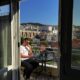 working from laptop in greece